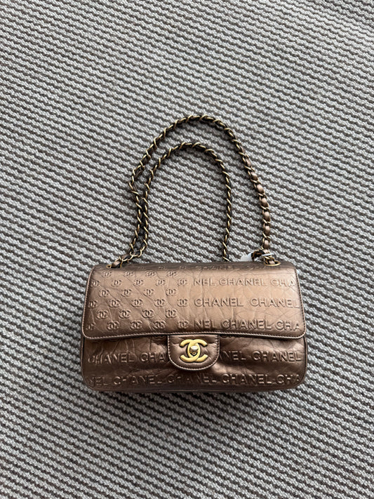Chanel metallic bronze-toned quilted embossed Logo Classic Flap Bag