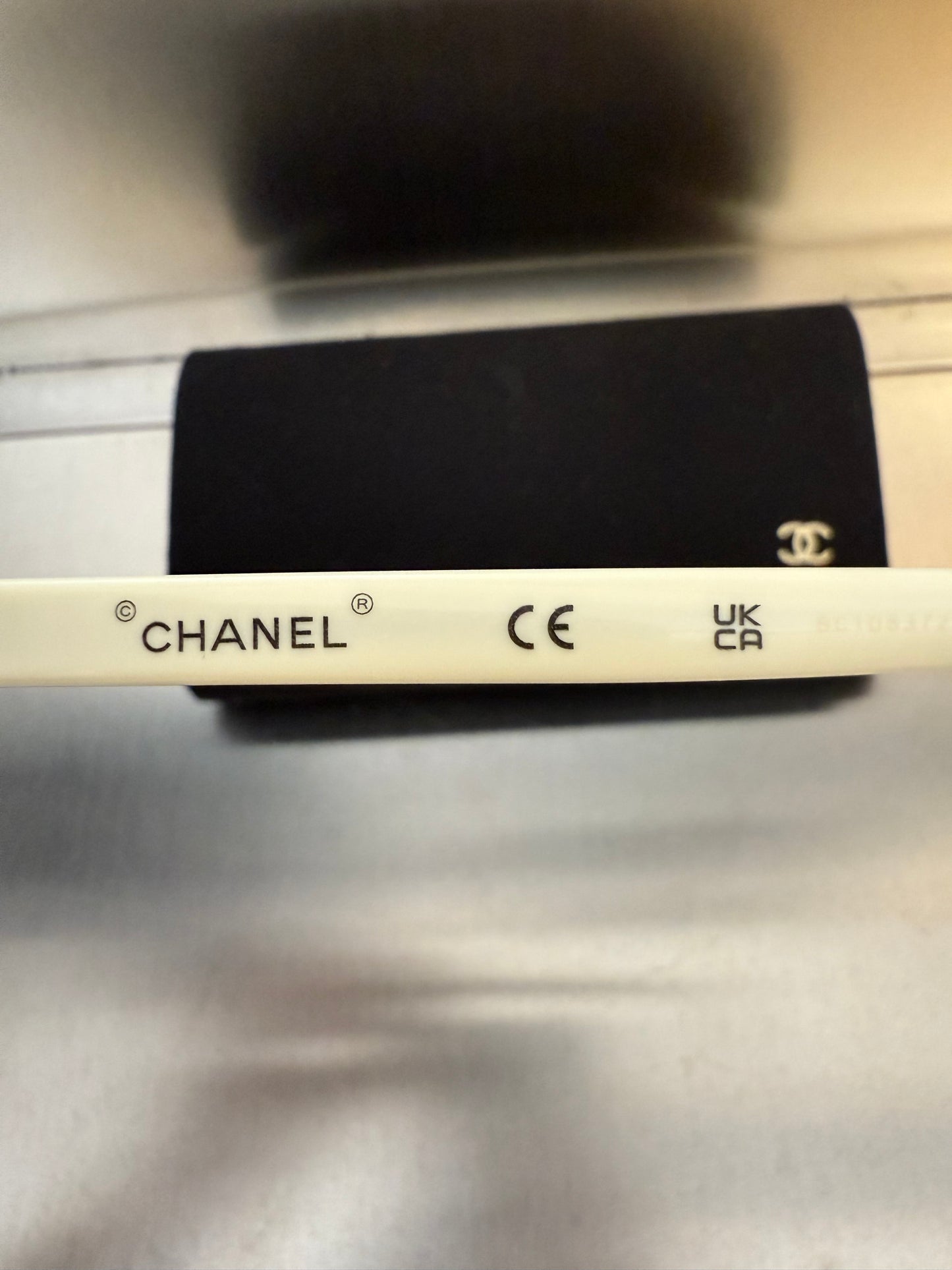 Chanel 23k white sunglasses