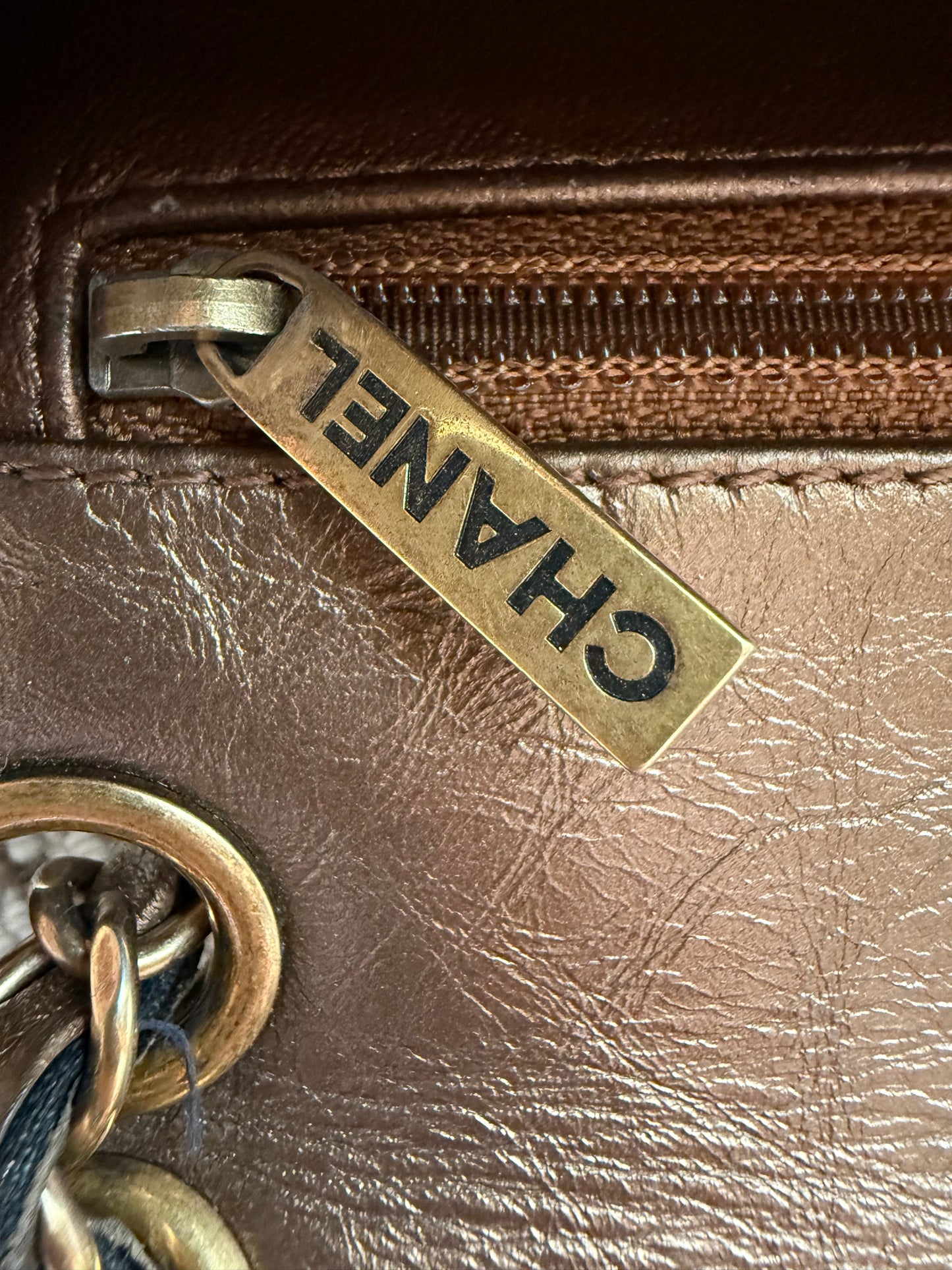 Chanel metallic bronze-toned quilted embossed Logo Classic Flap Bag